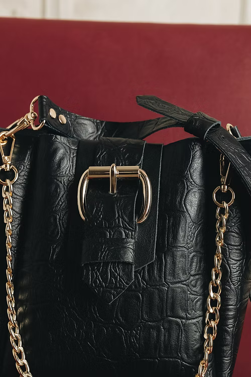 "MISSING" BLACK GOLD LEATHER BAG