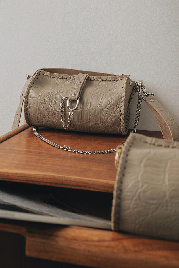 "HIGH ON EMOTION" BEIGE NICKEL BARREL BAG