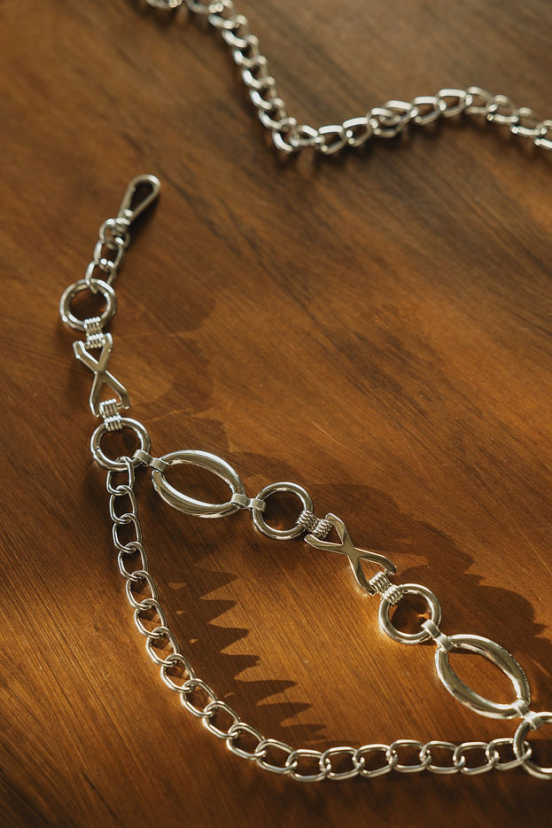 "DANCING WITH MYSELF" NICKEL CHAIN BELT