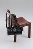 "ENDLESSLY" BLACK NICKEL BARREL BAG