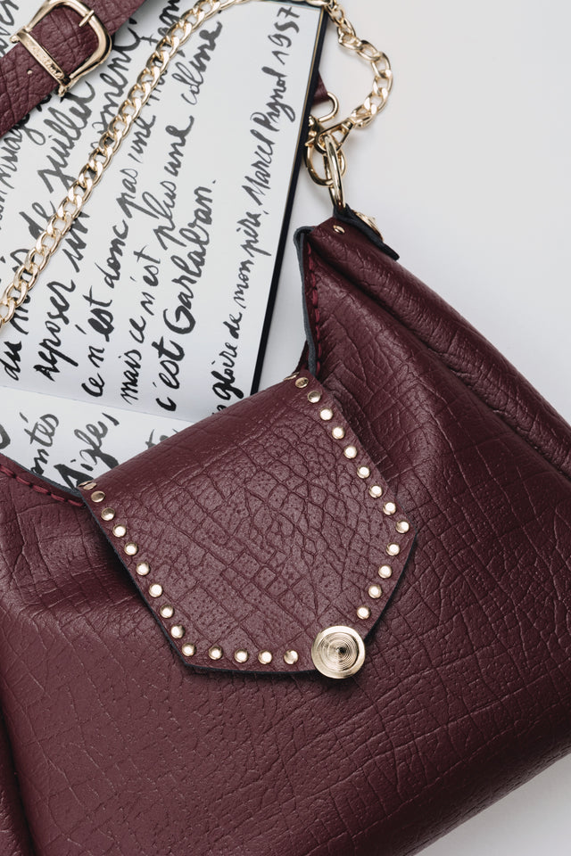 "SOMEWHERE I BELONG" CHERRY GOLD SHOULDER BAG