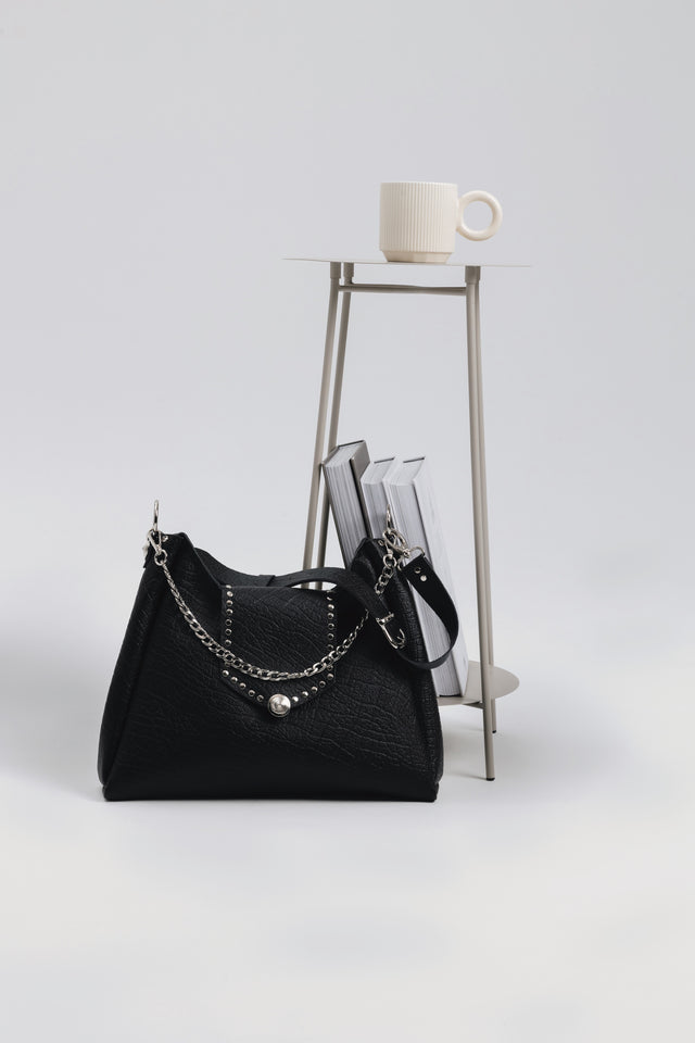 "SOMEWHERE I BELONG" BLACK NICKEL SHOULDER BAG