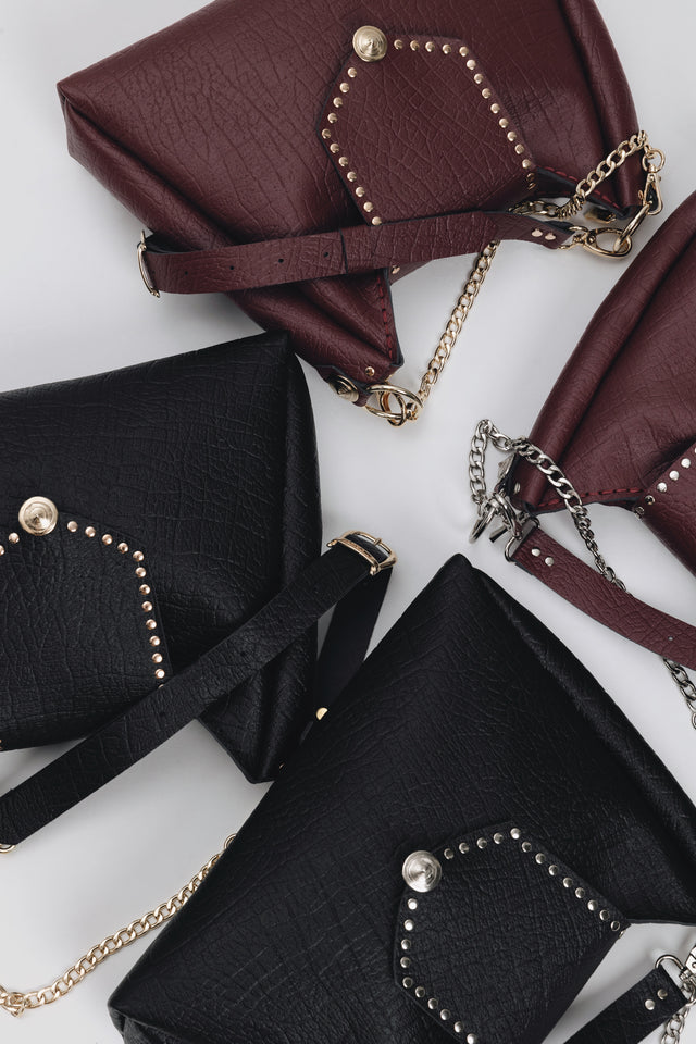 "SOMEWHERE I BELONG" BLACK NICKEL SHOULDER BAG