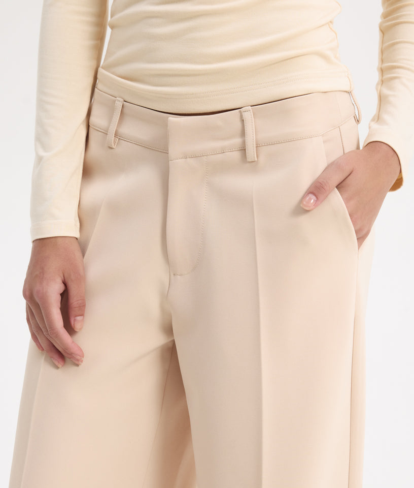 TYRA LOW WAISTED PANTS BEIGE